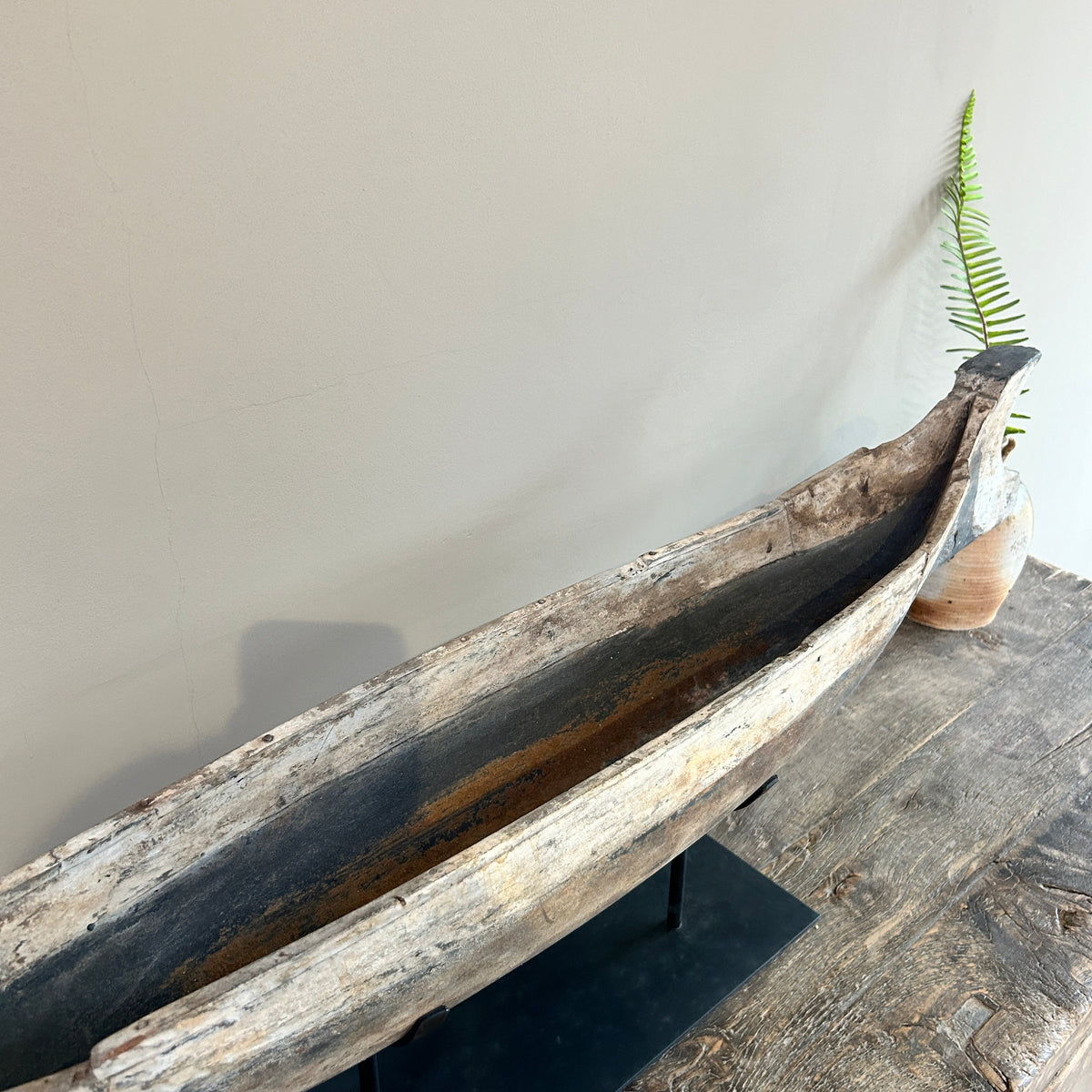 Antique wooden boat on stand | Krishna