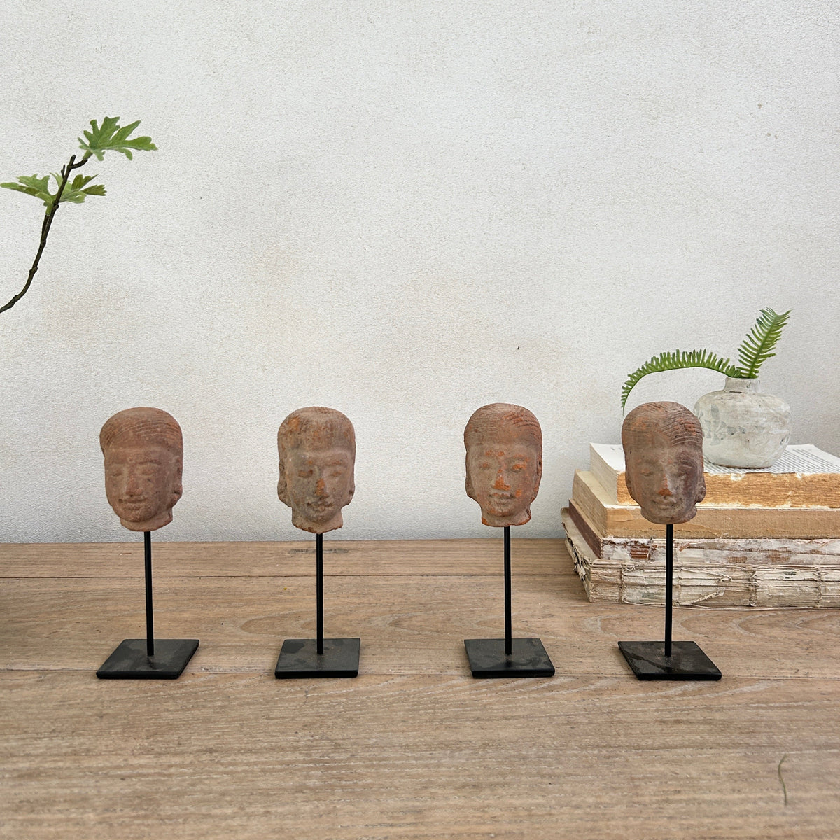 Hand-made antique terracotta heads on stand | Sita